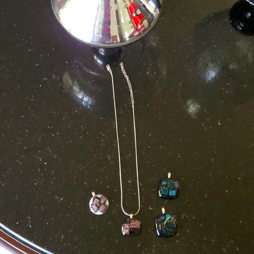 Silver necklace with 4 pendants